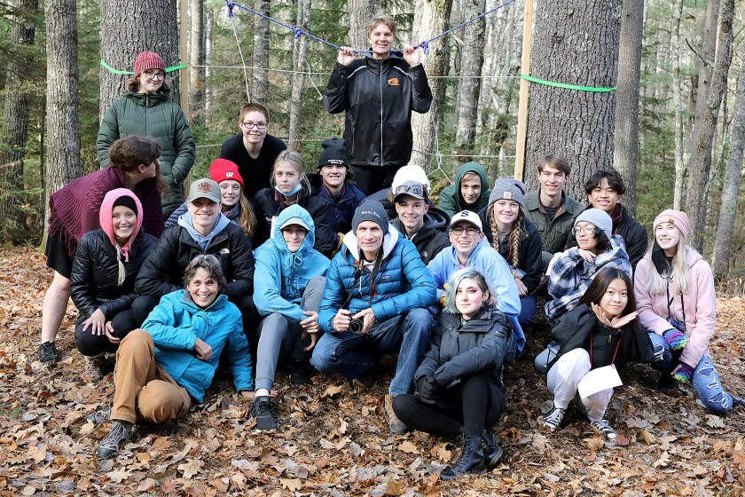 Lori Danz, front left, the Superior School Forest coordinator and science teacher at Superior High School, poses with part of Andy Wolfe and Christa Kalin’s journalism class at the school forest