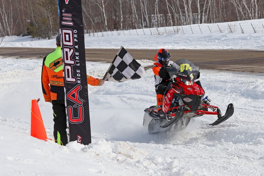 Snowmobilers race