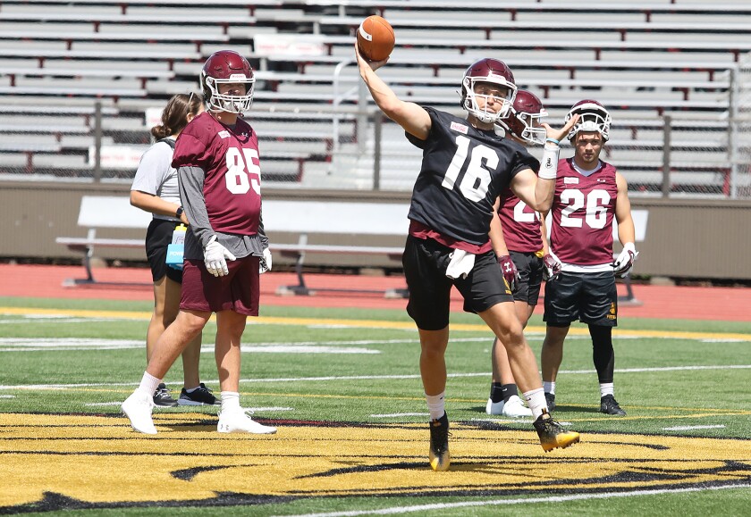 Bulldog quarterback Garrett Olson (16) throws a pass during practice