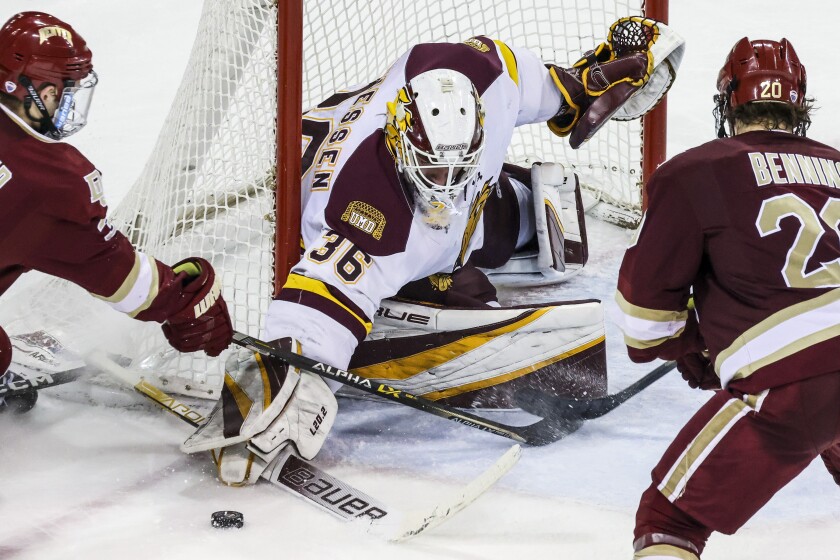 college men play hockey