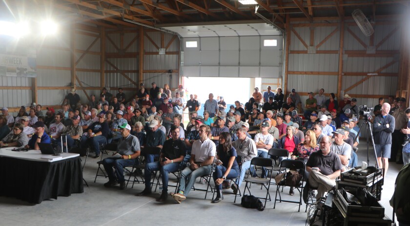 A good sized crowd of about 200 people attend an educational panel on a controversial carbon dioxide pipeline in South Dakota, at the Dakotafest farm show.