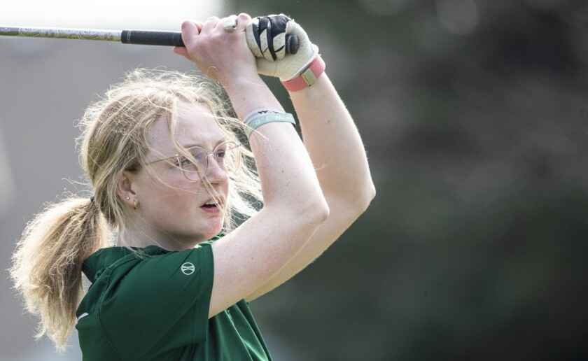 Lexi Macik of Community Christian School tees off during a Camden Conference boys and girls golf meet at Valley Golf Course Thursday, May 5, 2022, in Willmar.