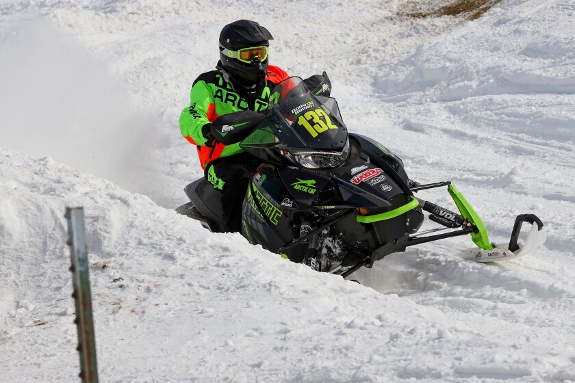 Snowmobilers race
