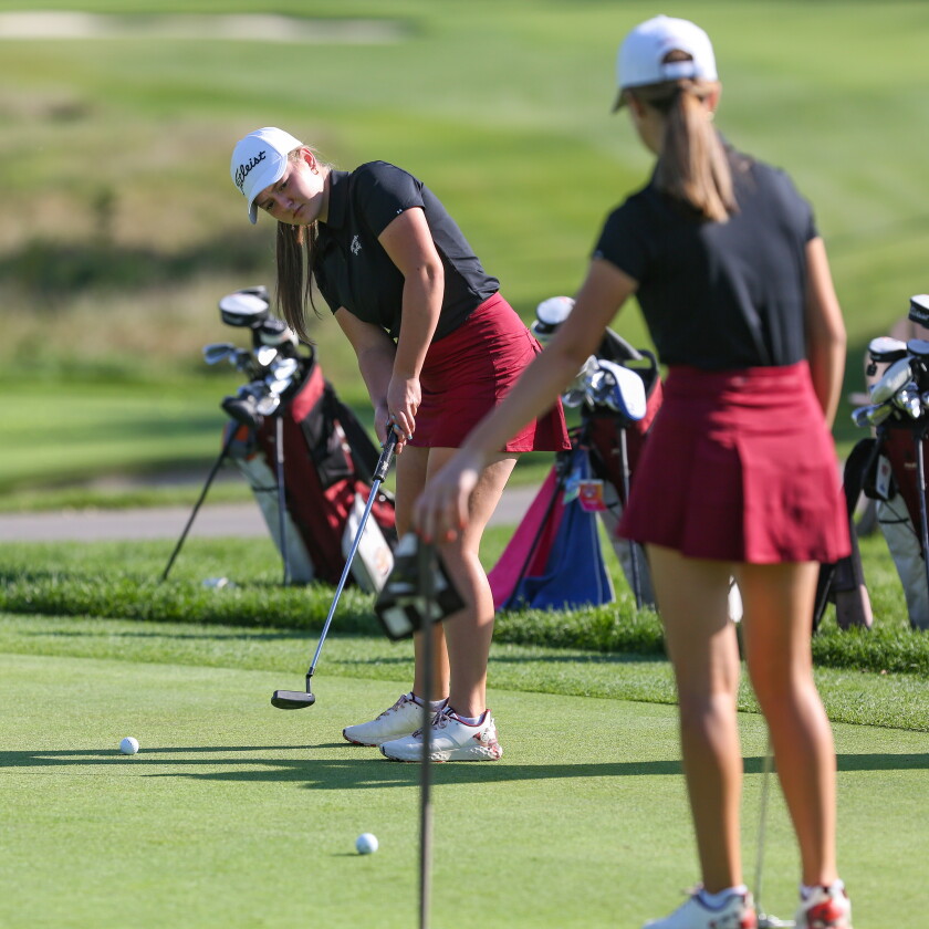 Fargo Oak Grove golfer Josie Geiger watches her putt roll towards the hole on Thursday, Sept. 25, 2025 at the Fargo Country Club in south Fargo.