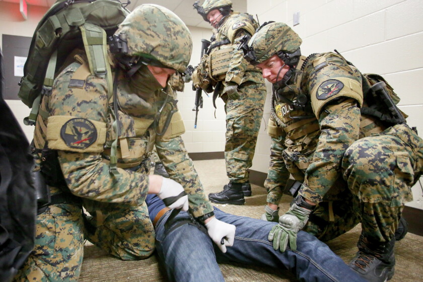 Swat Rescuing 'Watching your back': Elite paramedics work alongside Red River Valley ...