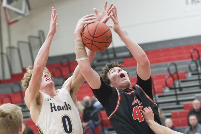 high school boys play basketball game