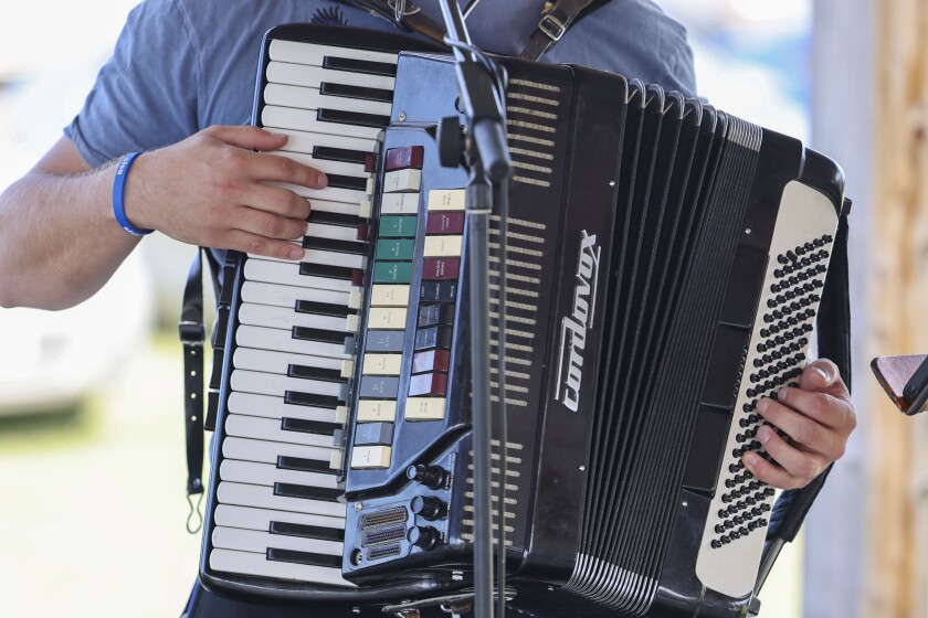 man performs with accordion
