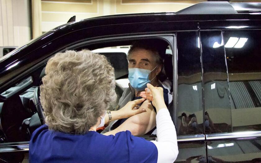 PHOTO: Governor Doug Burgum receives COVID-19 vaccination