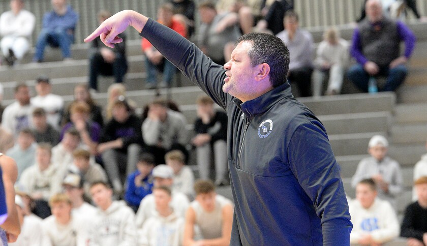 CMCS head boys basketball coach Ted Taatjes signals to his players during the Section 3A-North championship game against Dawson-Boyd on Saturday, March 8, 2025 at the R/A Facility in Marshall.