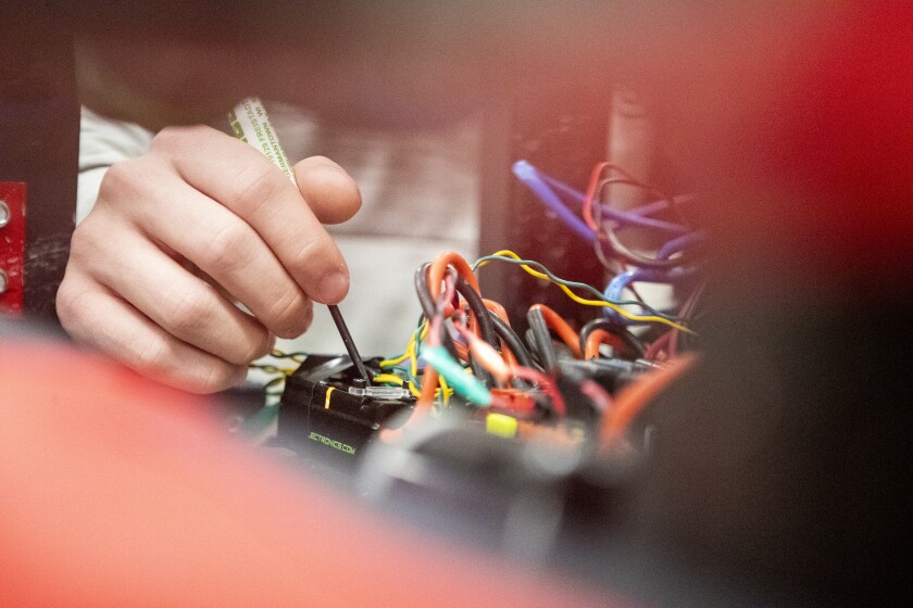 Willmar High School freshman Daniel Pauff works on some wiring during an afterschool gathering on Wednesday, Feb. 23, 2022. The team will be hosting this Saturday's FIRST Robotics Week Zero event at Willmar High School beginning at 9 a.m.