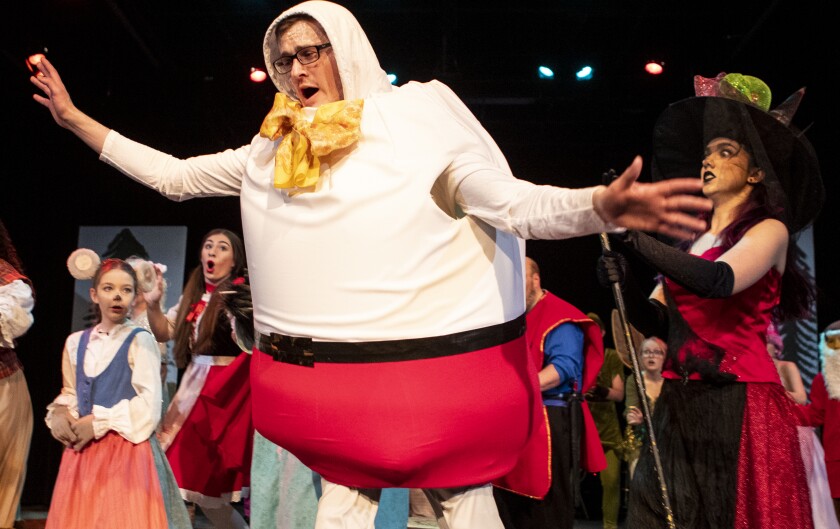 Humpty Dumpty, played by Nate Lundstrum, nearly takes a fall while making an appearance with fellow fairy tale characters during a dress rehearsal at the Barn Theatre on Saturday, June 4, 2022.