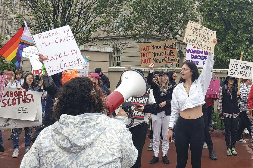 Protesters with signs in Superior.