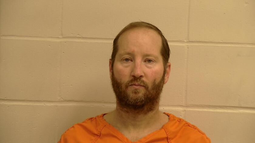 Eric Reinbold booking photo Pennington County