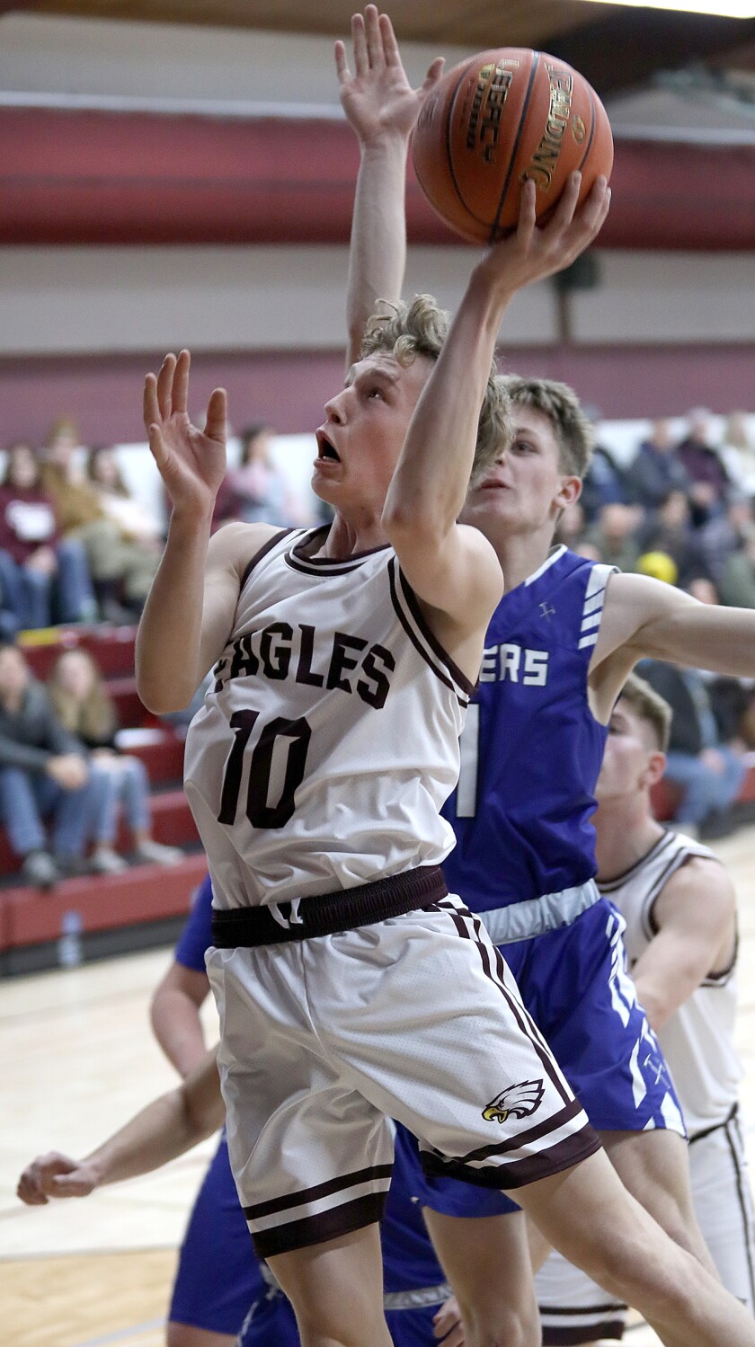 Solon Springs’ Carson Kaunonen (10) scores on the Mellen defense