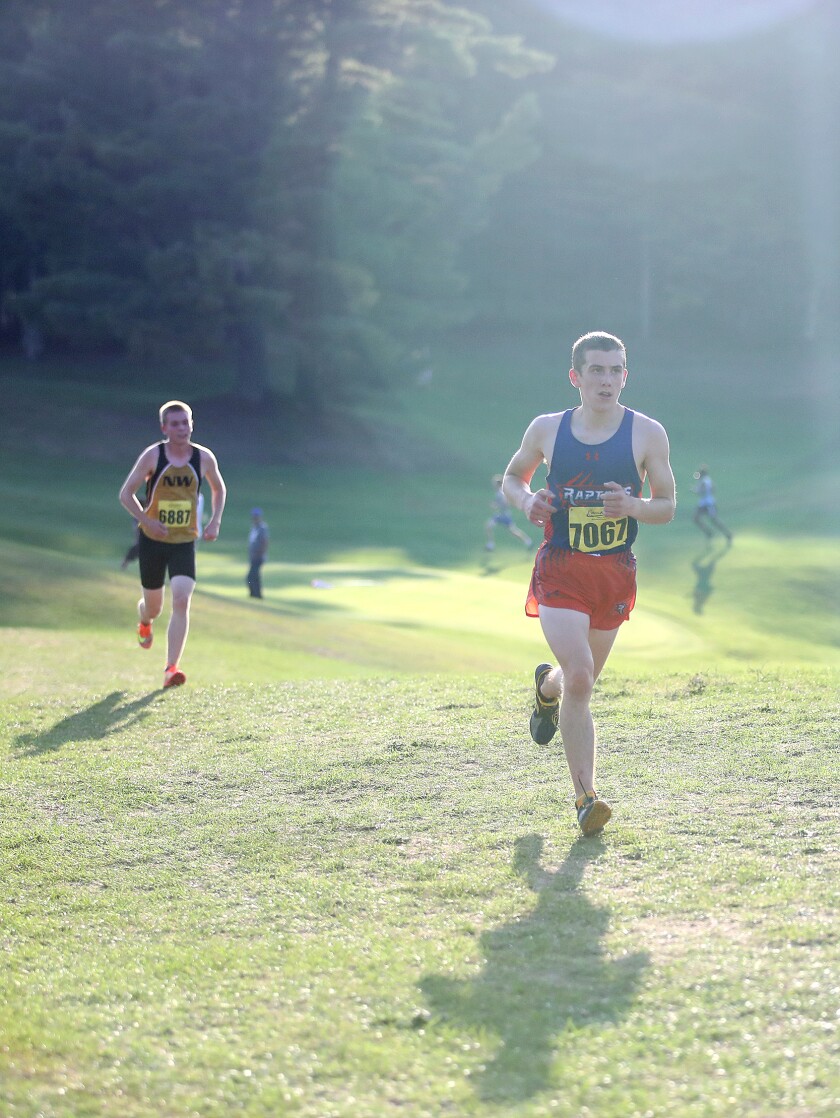 Wrenshall-Carlton’s Jack Riley (7067) builds a lead over Northwestern’s Emmett Johnson (6887) on his way to a first place finish