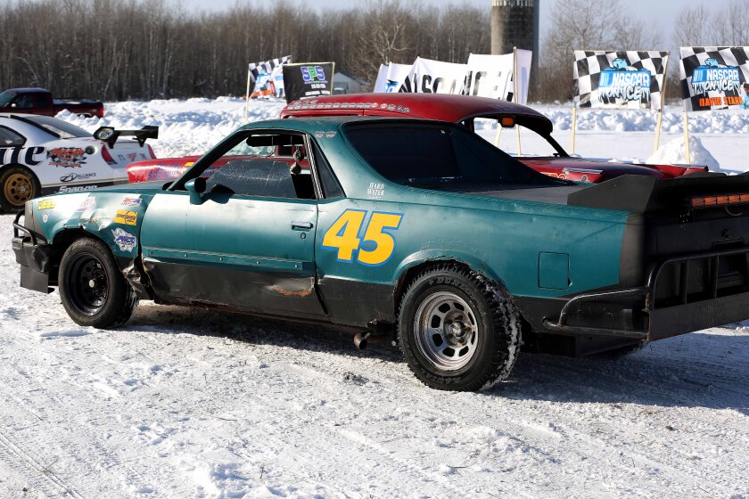 A green Chevrolet El Camino racecar