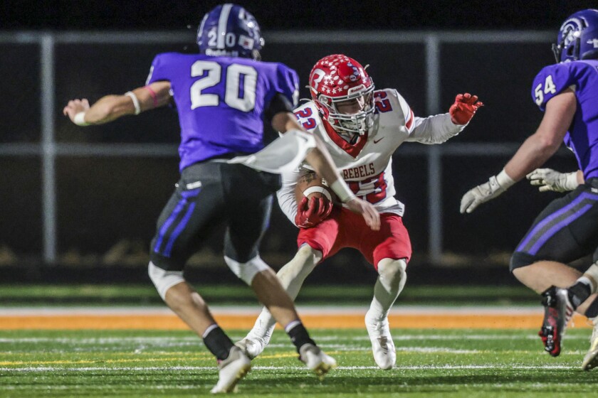 high school boys playing football