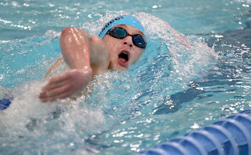 Superior’s Paolo Pagnucci grabs a breath as he swims to a second place finish in the 500 yard freestyle