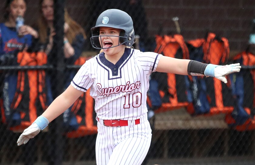 Player celebrates home run.