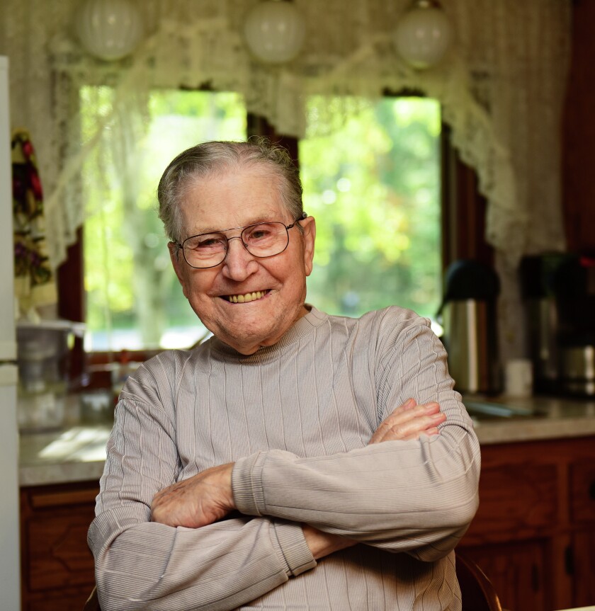 WWII veteran Ralph Yeager sits inside the kitchen at his home in Merrifield. Yeager was part of the famous 82nd Airborne Division, which fought in some of the war's most pivotal battles. Steve Kohls/Brainerd Dispatch
