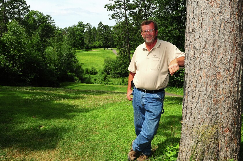 Gregg Gamble, owner of Emily Greens Golf Course stands on the No. 11 fairway. Brainerd Dispatch/Steve Kohls