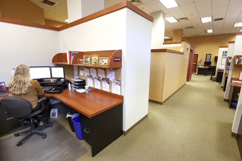 Woman working in an office.