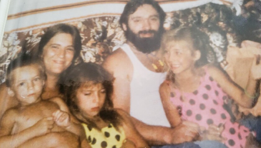 Tina Marcotte, boyfriend Patrick Gleason, and their three children..jpg