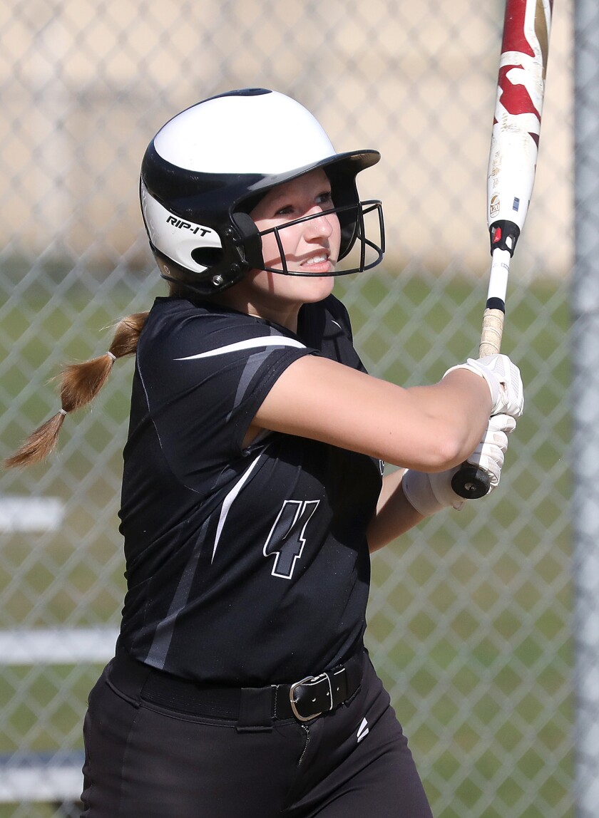 Northwood/Solon Springs’ Zoey Vaara (4) watches her ball fly into the outfield