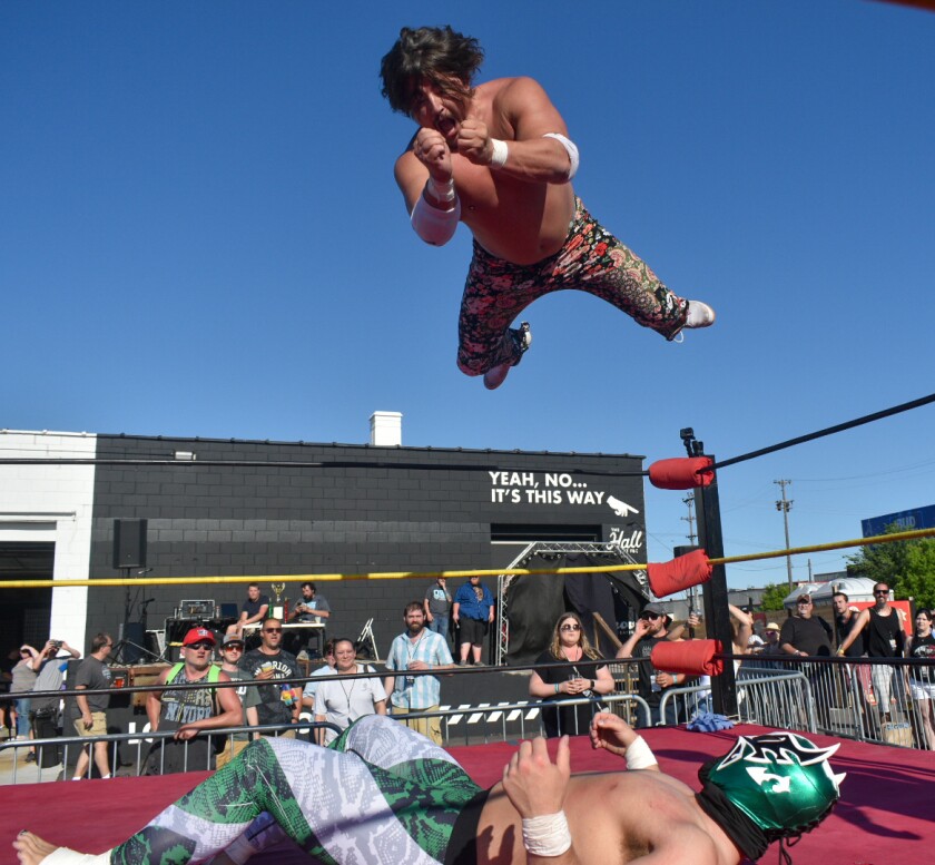 Professional wrestlers perform at an Under Zero Wrestling event.