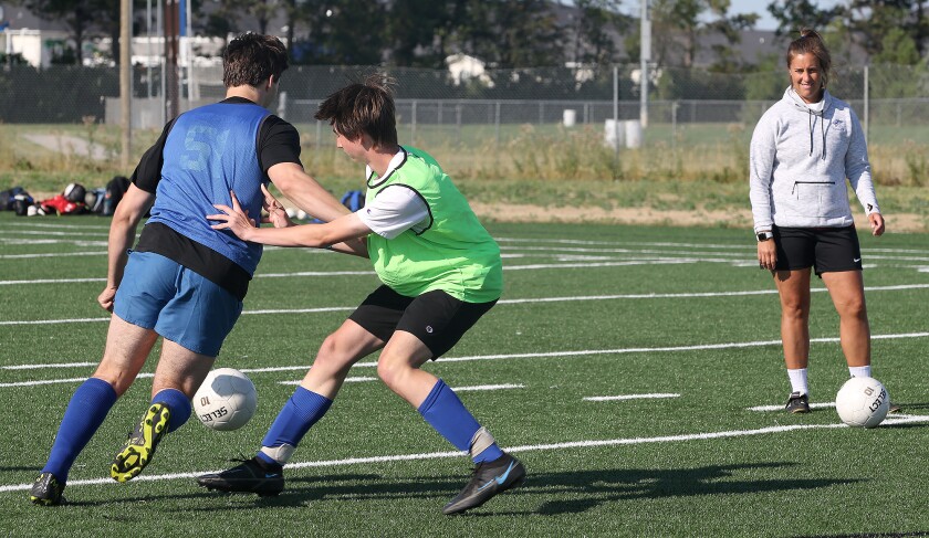 boys soccer practice with coach 080422.jpg