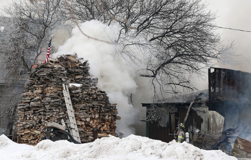ypsilanti fire wood pile scene 021522.jpg