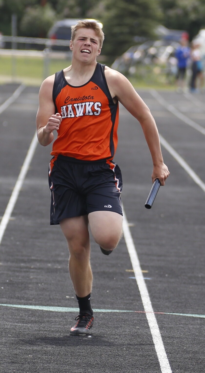 Canistota's Drew Suebert runs during the boys 4x200-meter relay at the Region 4B track and field meet on Thursday in Chester. (Eric Mayer/Republic)