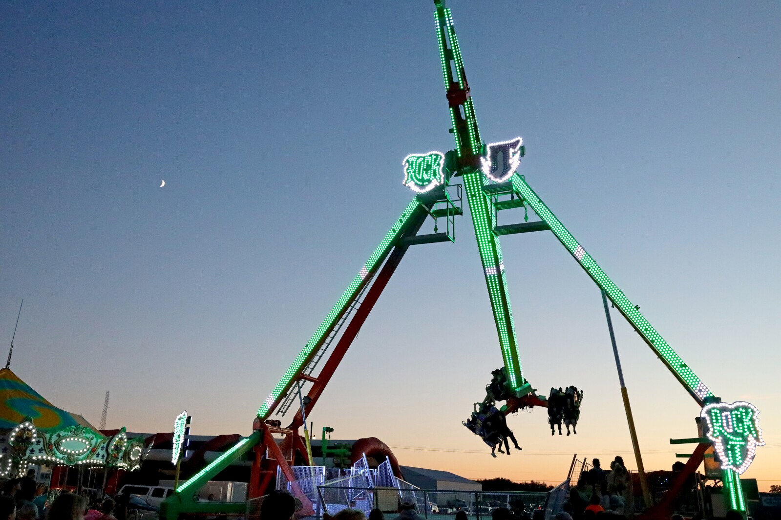People enjoy the Crow Wing County Fair midway.
