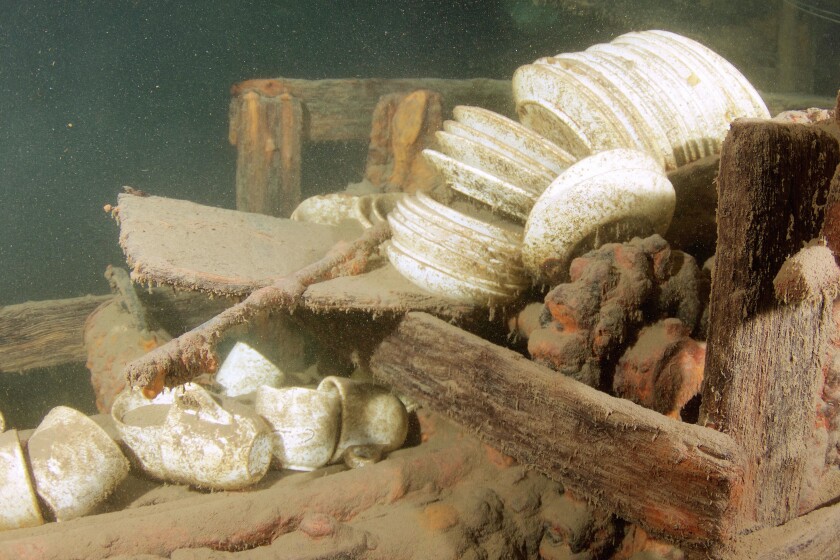 WRECK1103c4 -- Stacks of dishes can be seen in the wreck of the J.S. Seaverns in Lake Superior. The 130-foot package steamer sank in 1884. (Photo by Nick Lintgen)