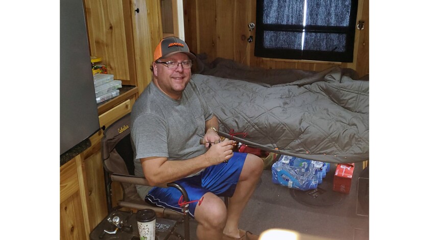 012620.N.GFH.WHEELHOUSE-Photo 2: Charlie Engen fishing.jpg
