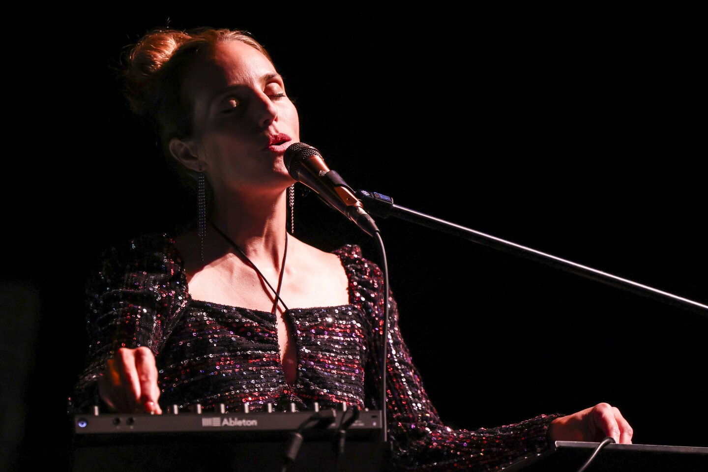 musicians perform on stage