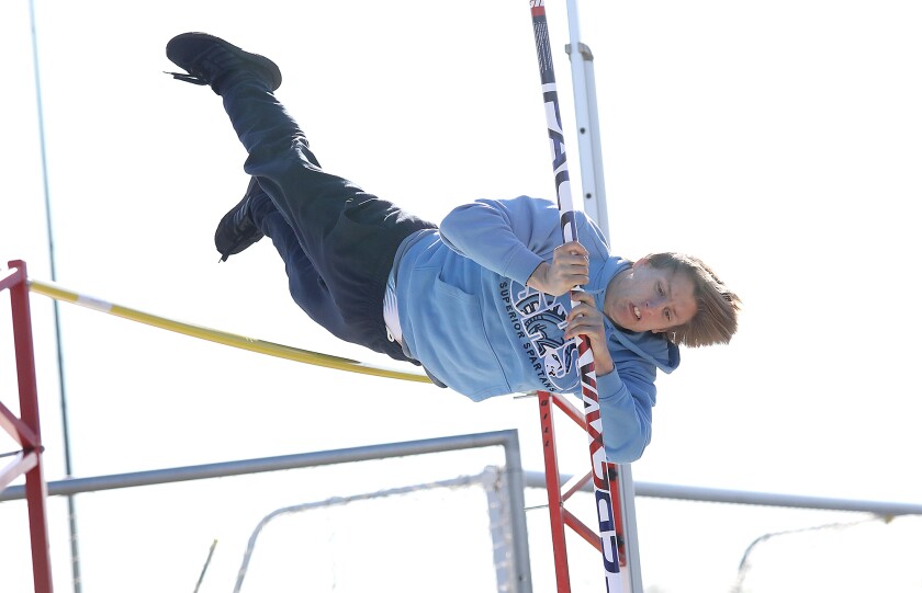 Superior's Jason Thomas vaults over the bar