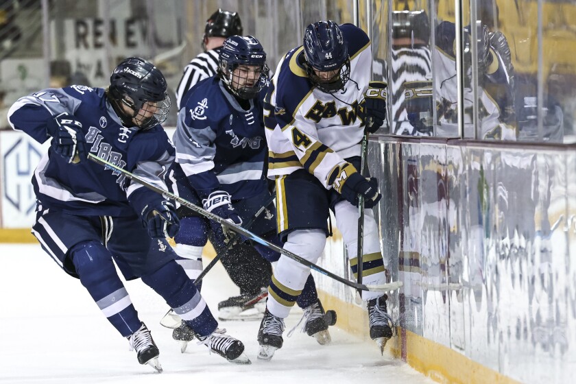 high school boys play ice hockey