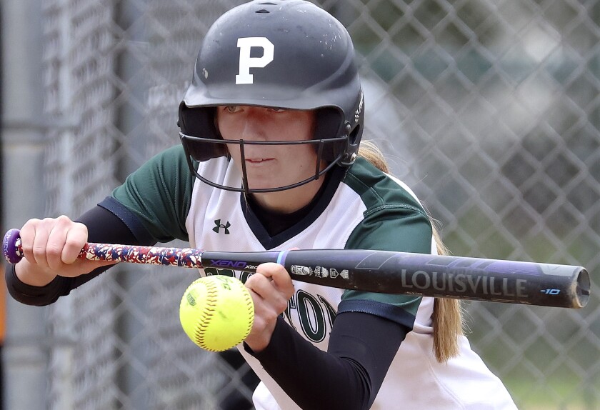 Softball action.