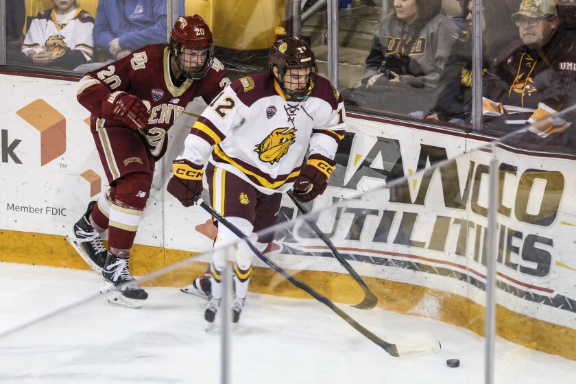 college men play hockey