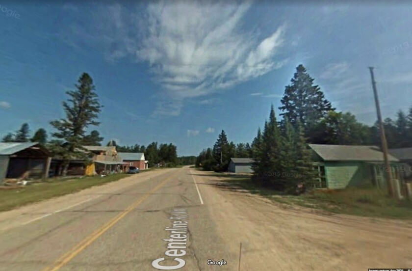 A screenshot shows a run running between about five old buildings in Pinewood, Minnesota