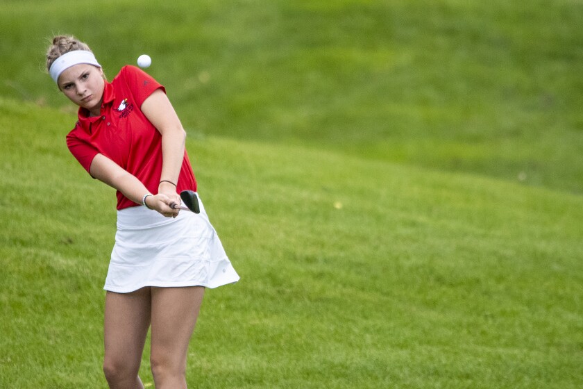 Lac qui Parle Valley golfer Molly Halvorson approaches the putting green while playing in the Class A girls golf tournament at Pebble Creek Golf Club in Becker on Wednesday, June 15, 2022.