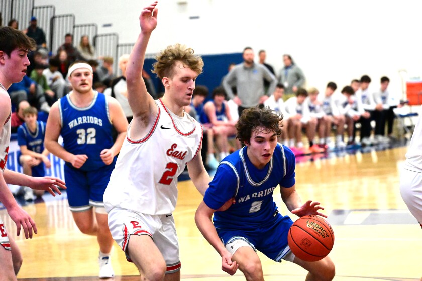 Brainerd Warrior Boys Basketball against the Duluth East.