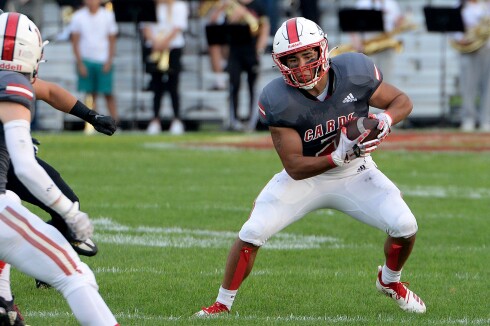 Willmar junior Ramero Trevino, right, looks to make a cut during a kickoff return in a North Central White District game against Hutchinson on Friday, Sept. 9, 2022 at Hodapp Field in Willmar.