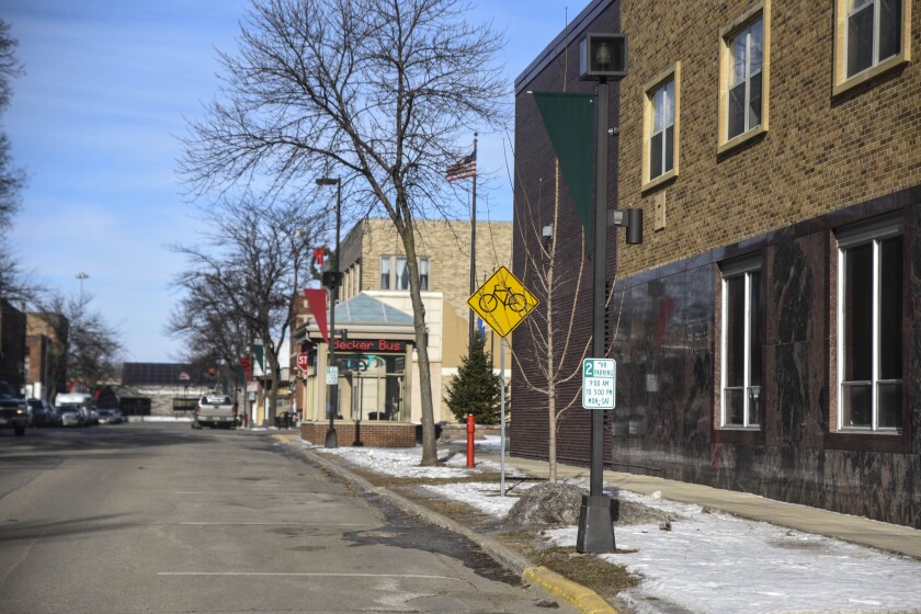 Erica Dischino / TribuneOld streetlights line Fourth Street Southwest in downtown Willmar. Willmar Municipal Utilities and city of Willmar staff have been discussing the replacement of the 208 light fixtures downtown.