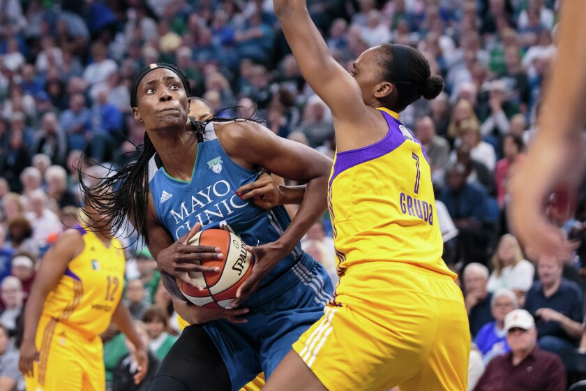 Minnesota Lynx center Sylvia Fowles (34) shoots in the second quarter against the Los Angeles Sparks forward Sandrine Gruda (7) in game two of the WNBA Finals at Target Center on Tuesday night. Photo by Brad Rempel-USA TODAY Sports