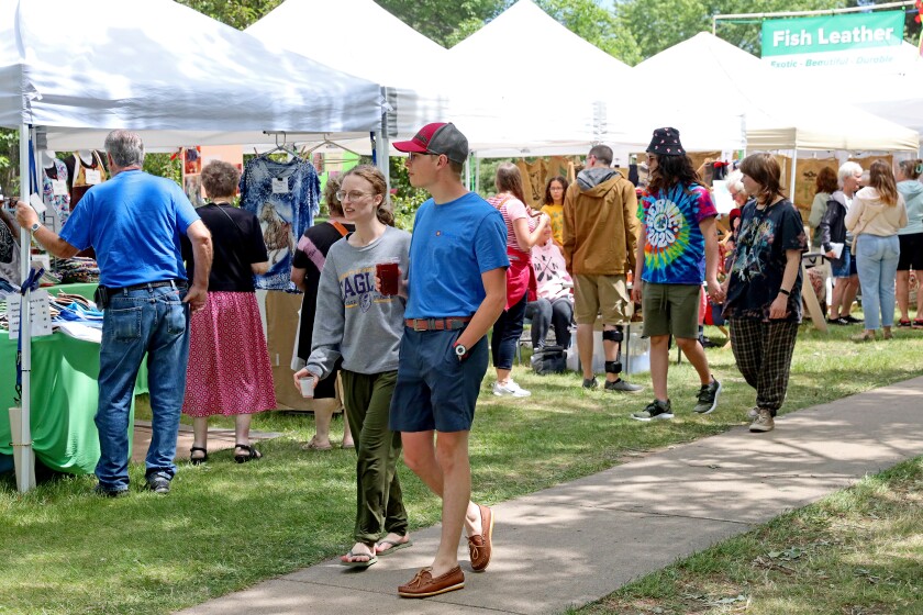 People attend Arts in the Park on Sunday, June 26, 2022, at Gregory Park in Brainerd.