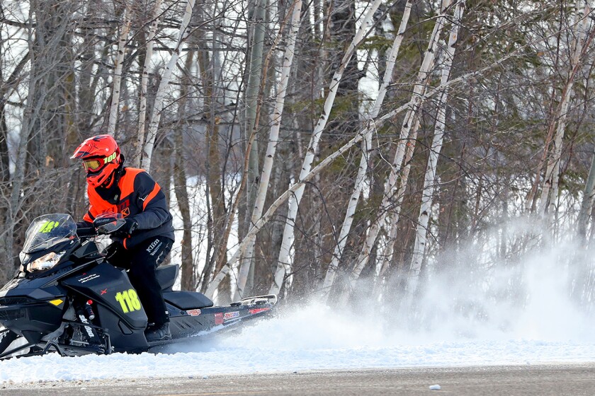 Snowmobilers race