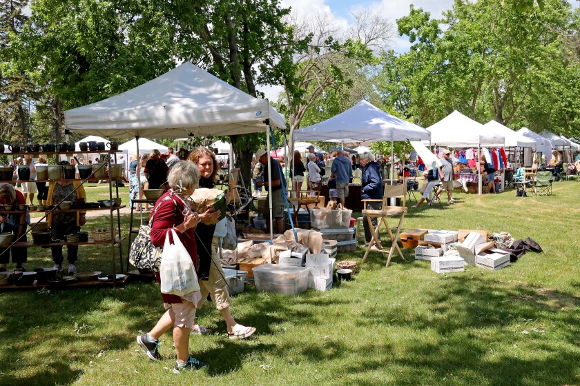 People attend Arts in the Park on Sunday, June 26, 2022, at Gregory Park in Brainerd.