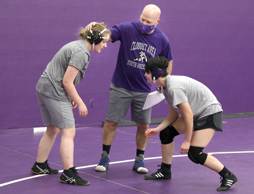 122321.s.pj.CECgirlswrrestling1.jpg